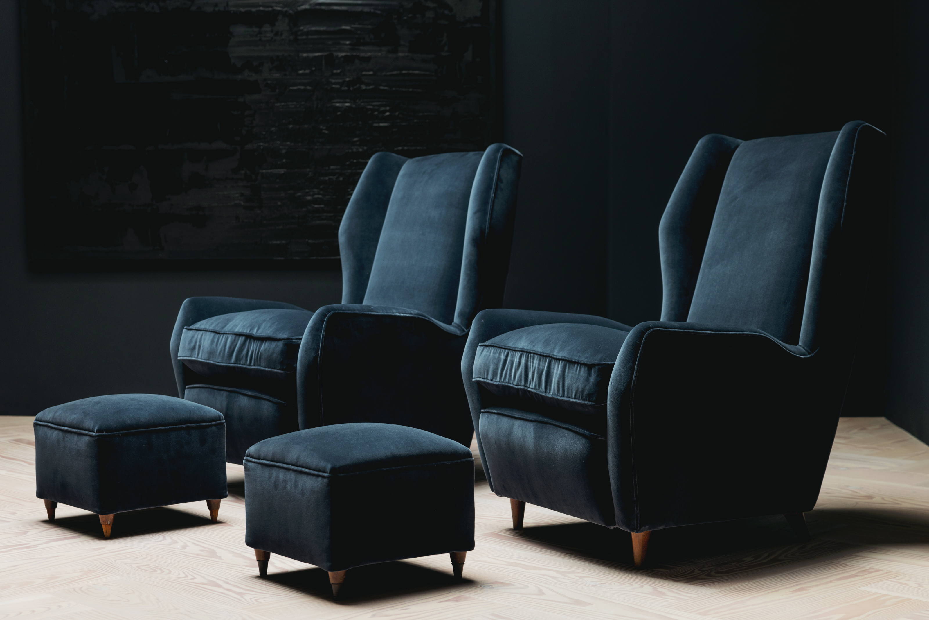 Pair of armchairs and footstools in velvet by Gio Ponti