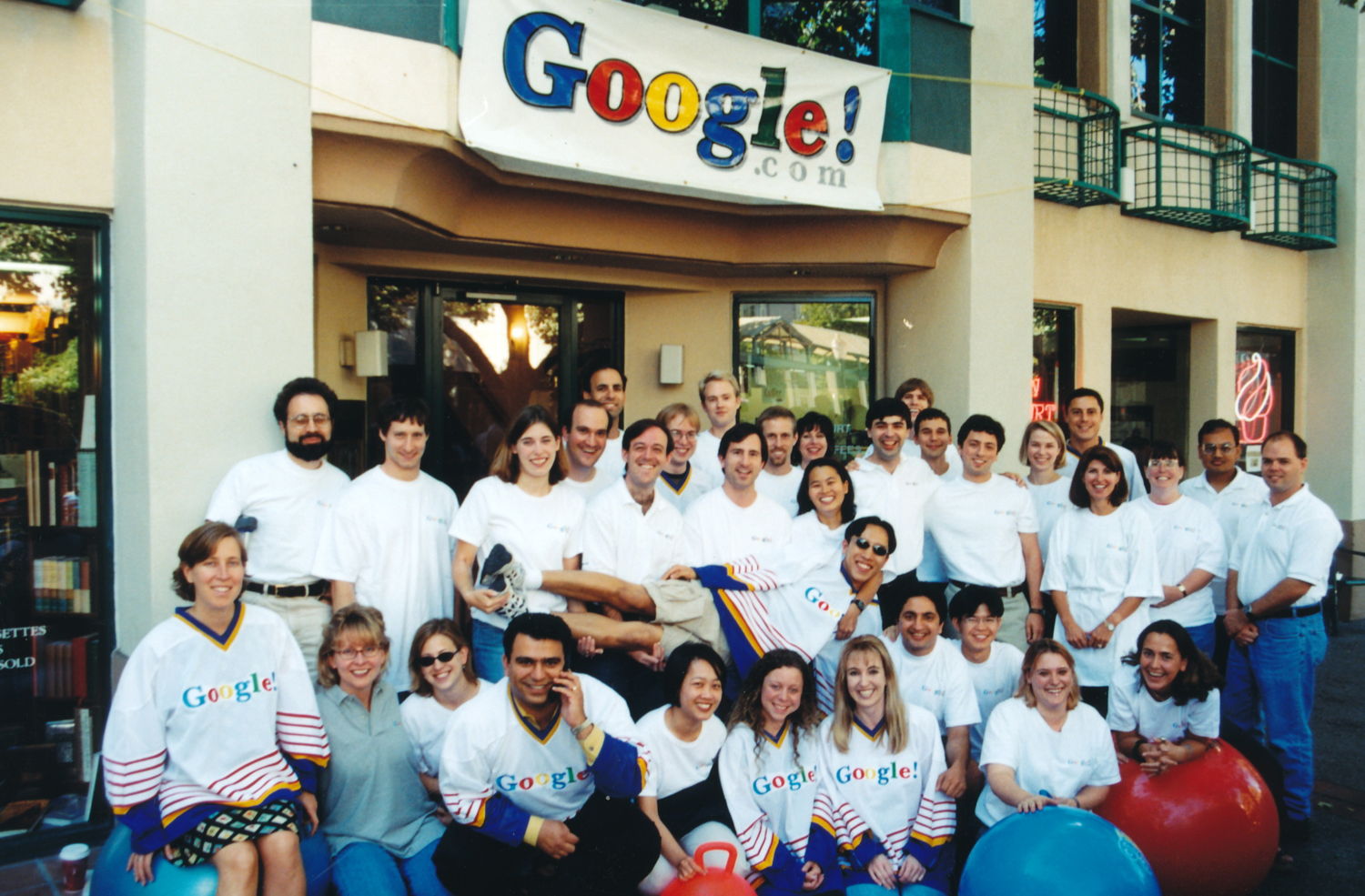 A team photo outside the Palo Alto office of the growing Google team before they moved to Mountain View. 
