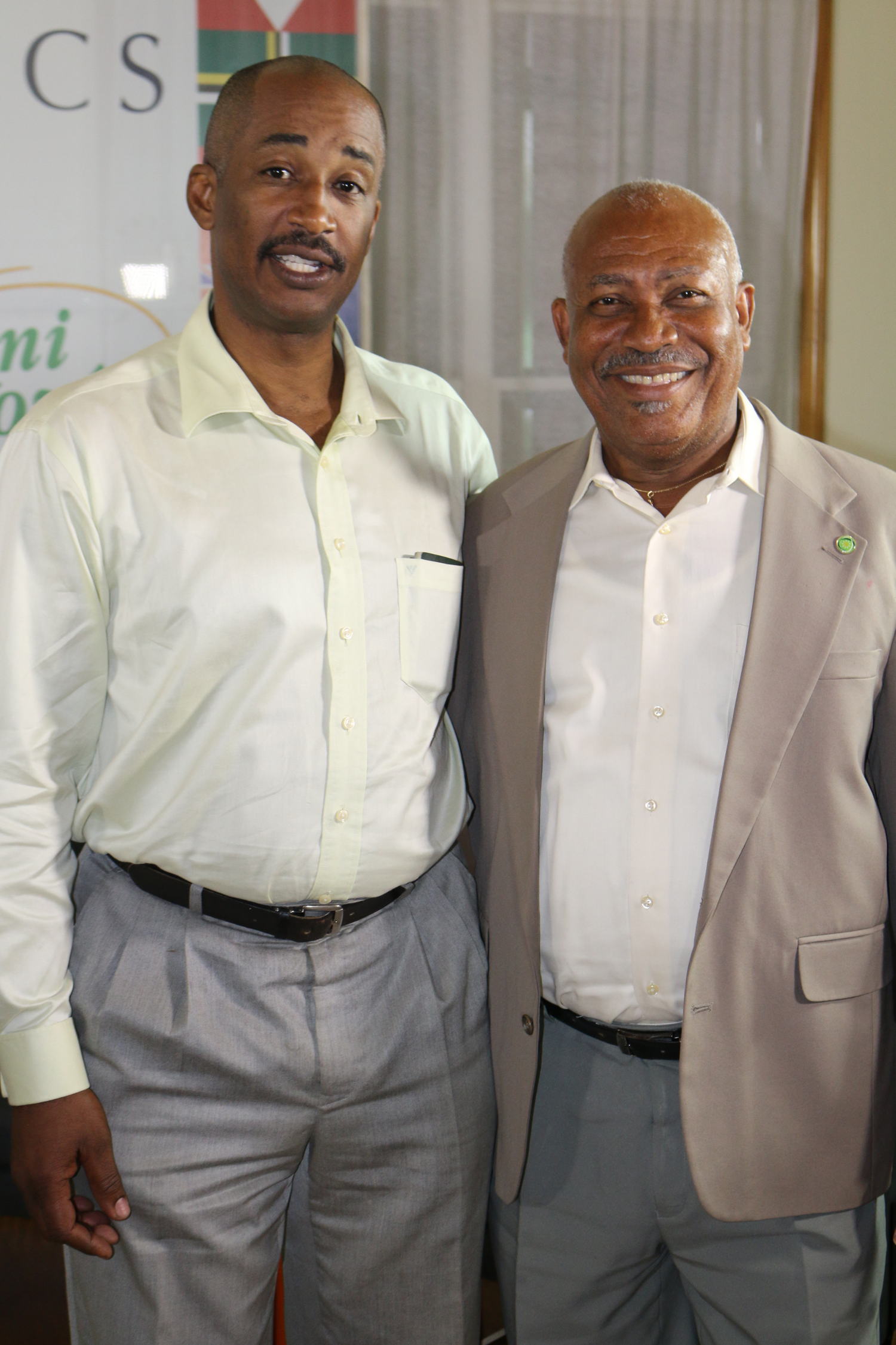 Crispin d'Auvergne and     OECS Ambassador Felix Gregoire