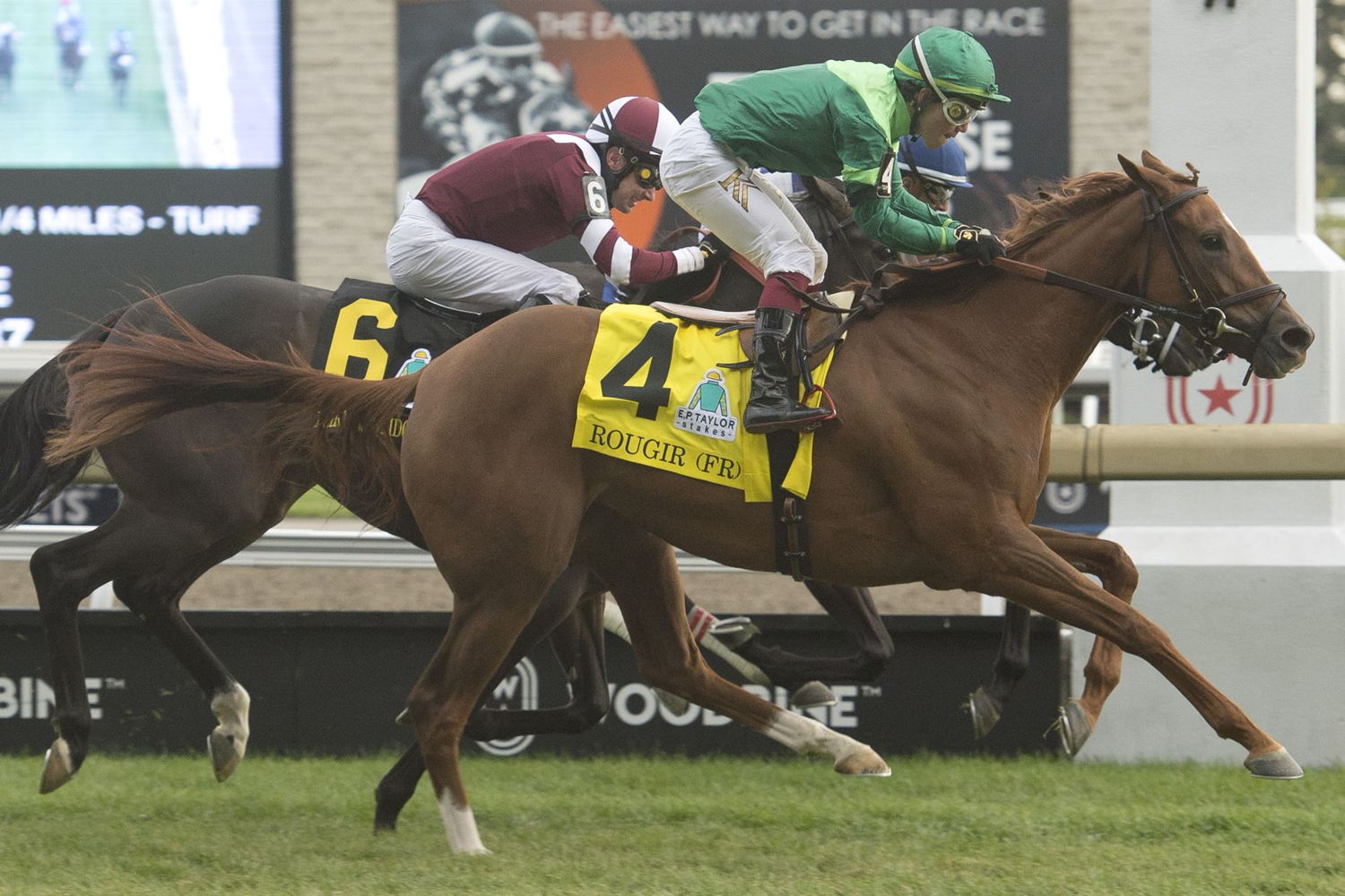 Rougir (FR) and jockey Kazushi Kimura winning the E.P. Taylor Stakes on October 8, 2022 at Woodbine (Michael Burns Photo)