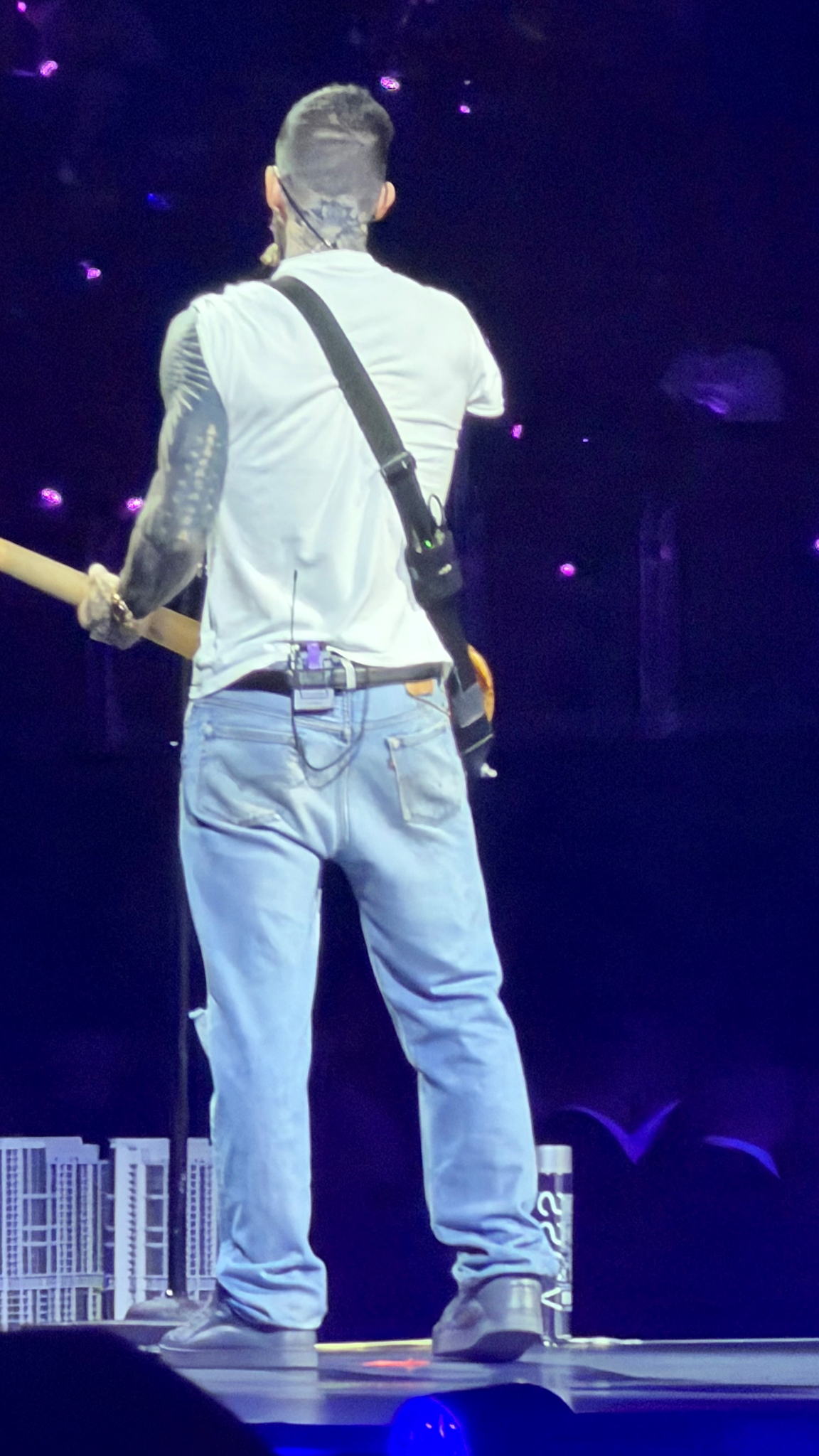 Frontman Adam Levine onstage using his Spectera bodypack and in-ear monitors during Maroon 5’s Love Is Like tour (photo coutesy of Ricky Garcia)