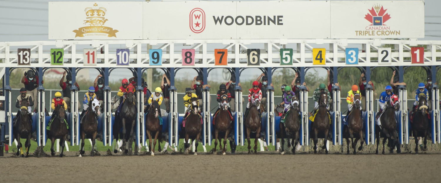Horses break from the gate in the 2021 Queen's Plate, first leg of the OLG Canadian Triple Crown. (Michael Burns photo)