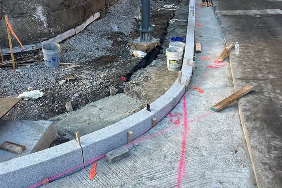 New granite curbs recently placed at Sixth Avenue and Diamond Street