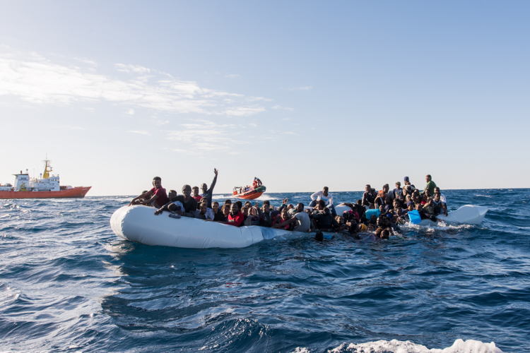 A sinking boat before rescue on 27 January 2018. A unknown number of men, women and children drowned. Copyright: Laurin Schmid/SOS MEDITERRANEE 