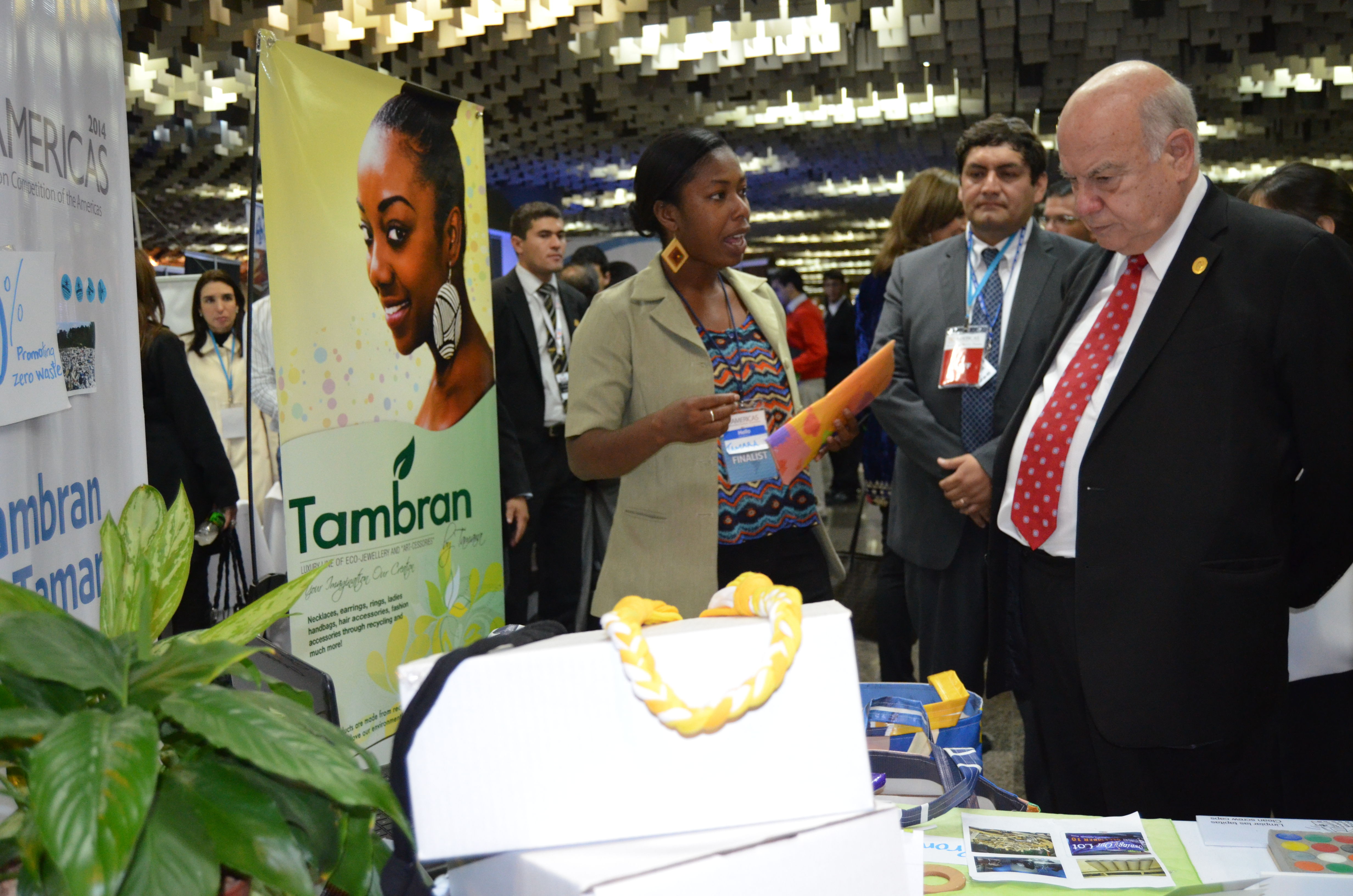 Tamara Prosper, owner of Tambran by Tamara presents her products to judges at an international expo.