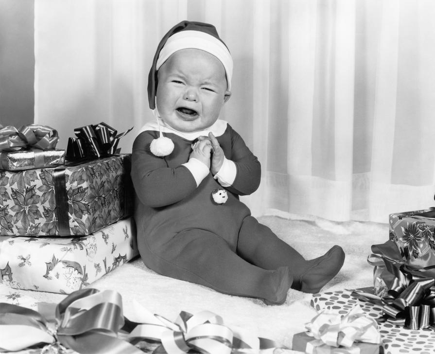 AKG2150985 1950s Crying baby dressed as Santa Claus © ClassicStock / akg-images / H. Armstrong Roberts