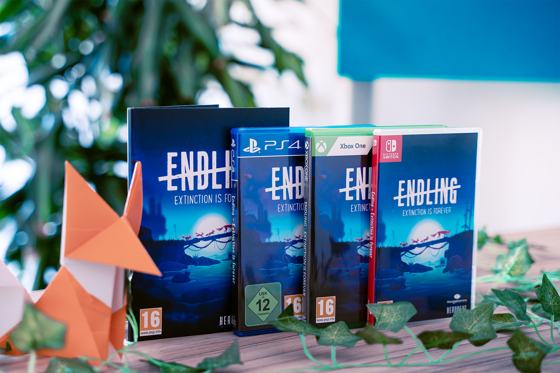 Endling - Extinction is Forever boxes with an extra "foxigami" in the PC-Version.