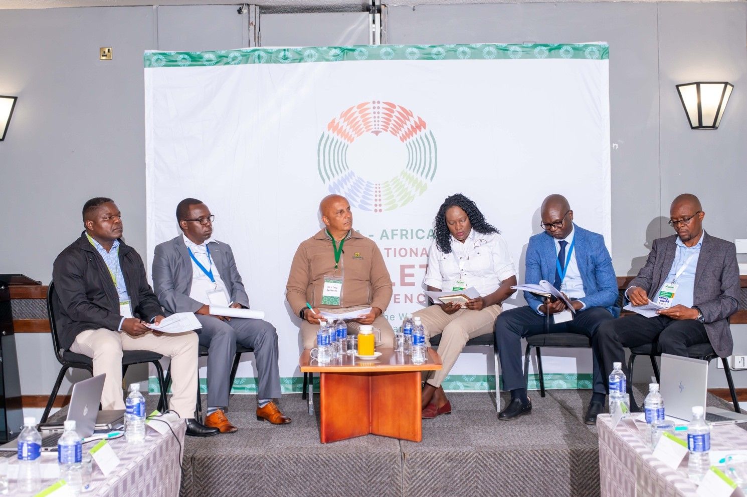 Panelists engage in discussions during the sessions: (L-R) Dr Hapson Mushoriwa, Principal Scientist, Rapid Generation Advancement - Accelerated Crop Improvement-ICRISAT Zimbabwe, Dr Xavier Poshiwa (Academic Dean, Gary Magadzire School of Agriculture, Great Zimbabwe University, Mr Ivan Craig, Sales and Marketing Director, AgriSeeds, Ms Zororo Taruvinga, Founding Director, Zoro NeMugoti, Mr Onismus Chipfunde, Head of Institute, Genetic Resources and Biotech Institute of Zimbabwe-Harare Agricultural Research Centre, Mr Prince Kuipa, Operations Director, Farmers Union Zimbabwe.