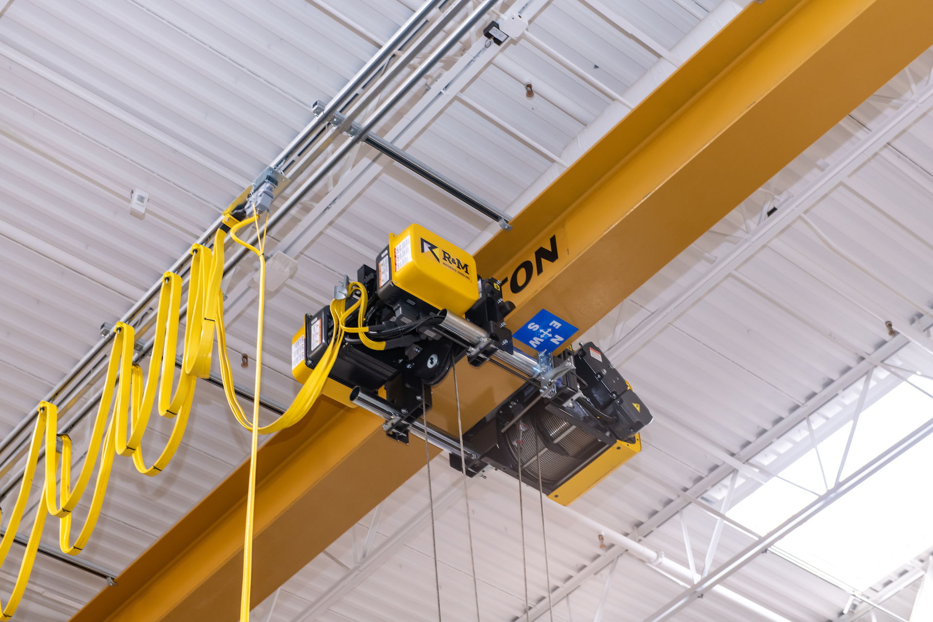 5-ton capacity top-running, single-girder crane kits were provided by R&amp;M Materials Handling Inc.