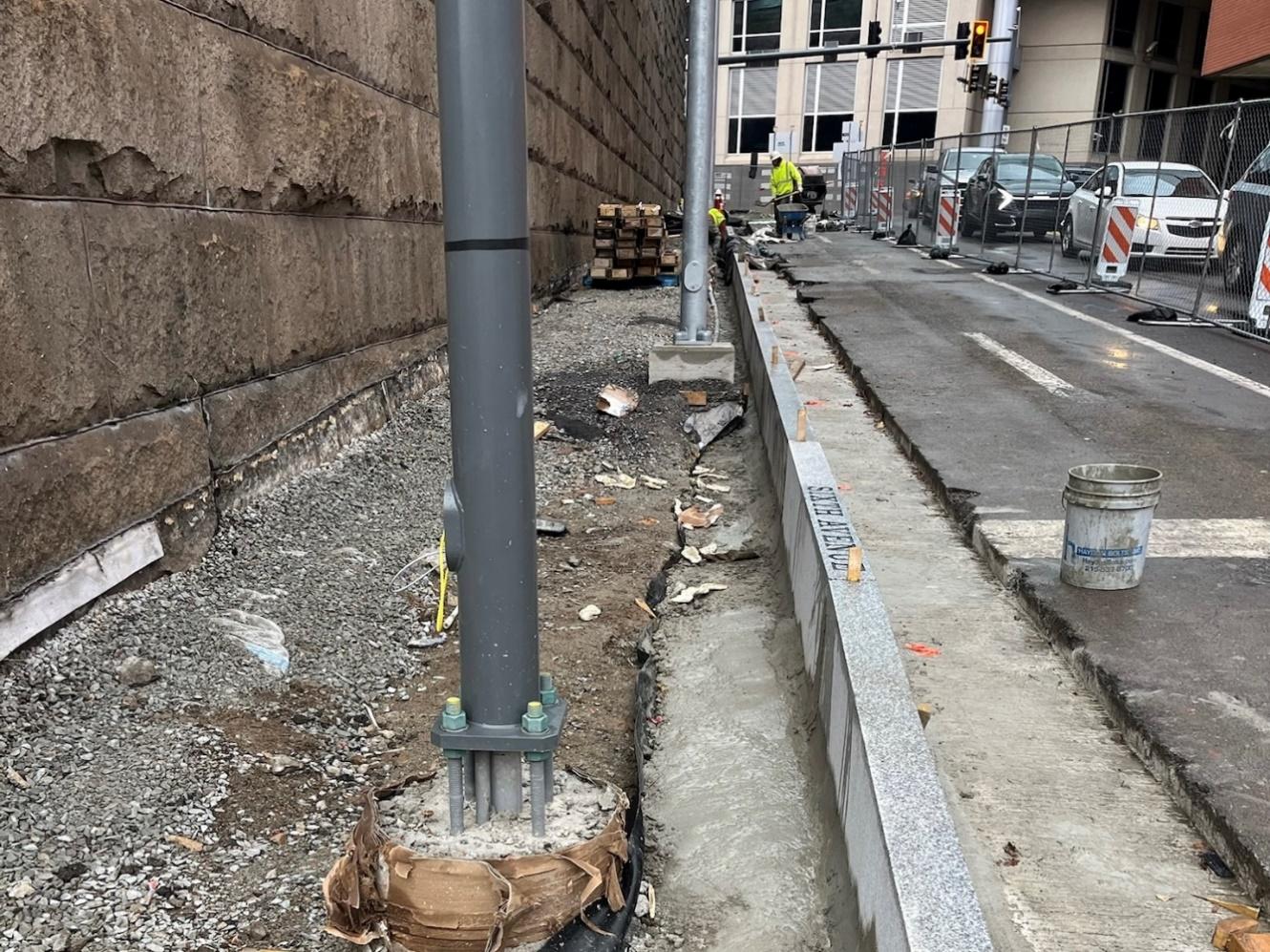 Granite curbs being installed at Sixth and Diamond Street Granite curbs being installed at Sixth and Diamond Street