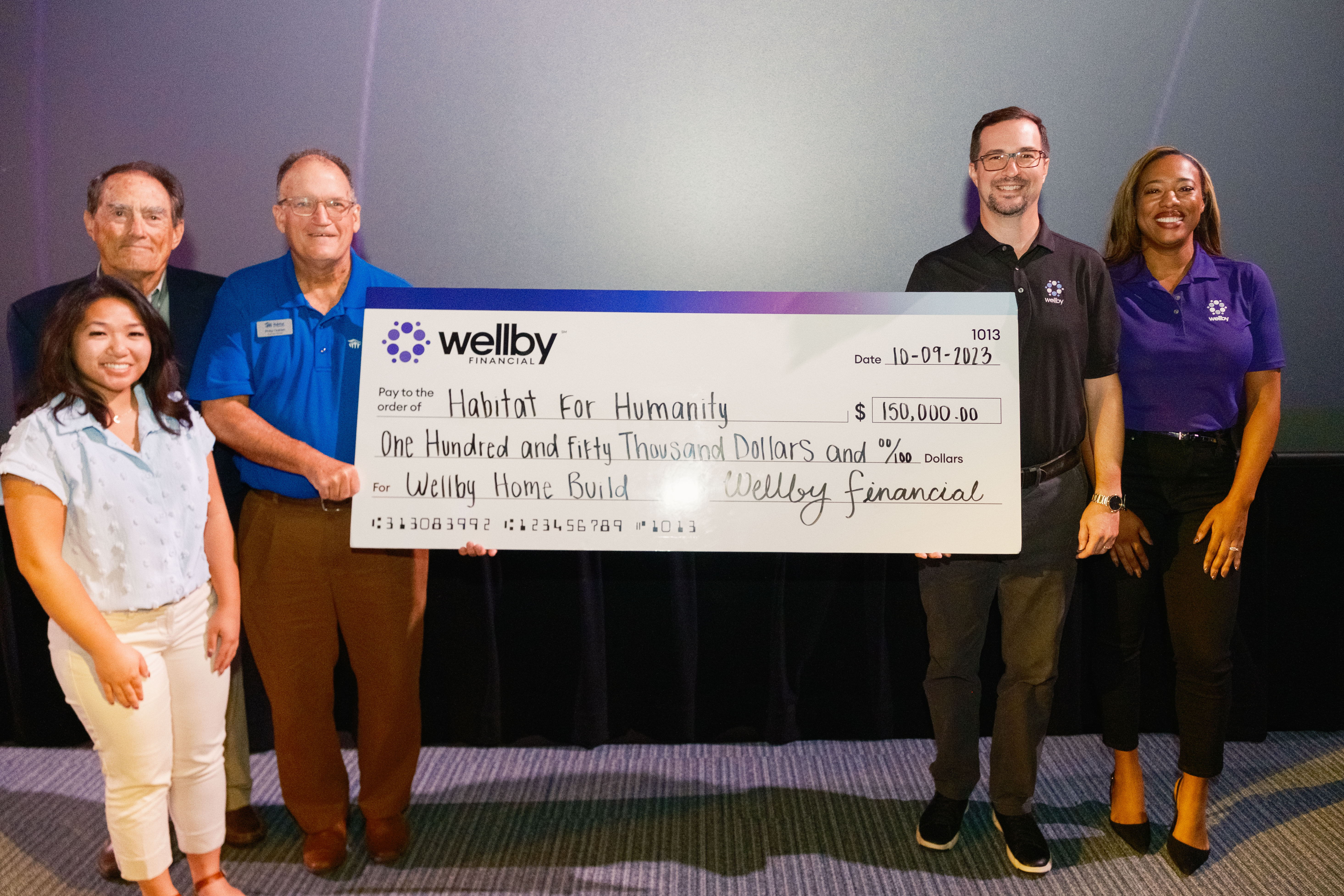 Pictured above on the left: Bay Area Habitat for Humanity Marketing & Development Coordinator, May Phan; Board Member, Mike McCroskey; and Executive Director, Philip Golden
​
Pictured above on the right: Wellby Financial President & CEO, Marty Pell; and Chief Retail Officer, Monique Gunter