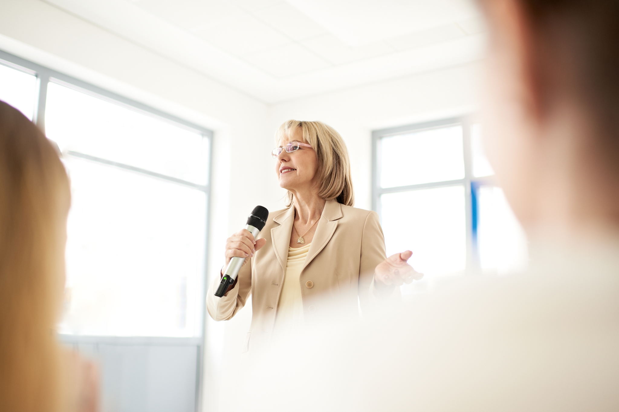 A handheld transmitter – or a bodypack transmitter with a clip-on or a headset microphone – allows the professor to move freely A handheld transmitter – or a bodypack transmitter with a clip-on or a headset microphone – allows the professor to move freely