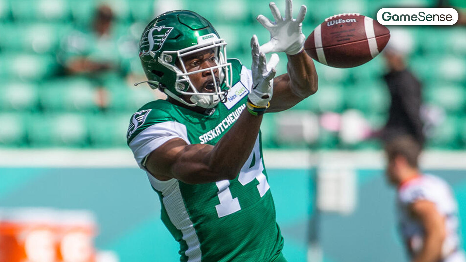 Tevin Jones (14) with Saskatchewan Roughriders - Photo Courtesy: CP Images