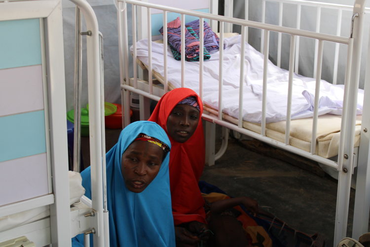 Caretakers of patients in critical cases measles ward in Anka General Hospital run by MSF: “We could not vaccinate our children. And we don’t know if our husbands will allow us to come and get the vaccine for the younger children. The roads are too dangerous and our husbands won’t allow it. In our village, near Bagega area, you’re not safe even inside your house. There are bandits everywhere. You can’t even prepare a meal and eat it in your house, so we prepare the meal and take it to the bushes to hide away from the armed med and eat. There is hardly a week without someone being kidnapped in our village.” Caretakers of patients in critical cases measles ward in Anka General Hospital run by MSF: “We could not vaccinate our children. And we don’t know if our husbands will allow us to come and get the vaccine for the younger children. The roads are too dangerous and our husbands won’t allow it. In our village, near Bagega area, you’re not safe even inside your house. There are bandits everywhere. You can’t even prepare a meal and eat it in your house, so we prepare the meal and take it to the bushes to hide away from the armed med and eat. There is hardly a week without someone being kidnapped in our village.”