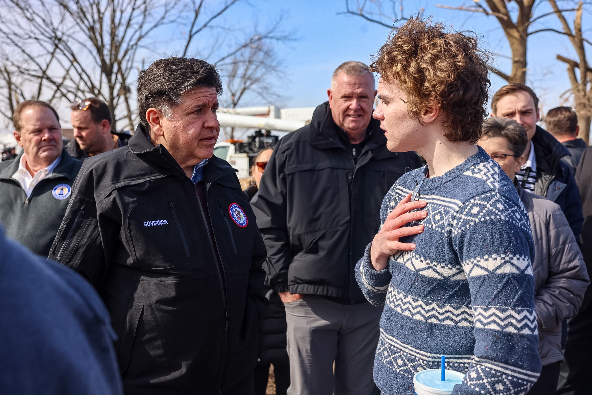 Governor Pritzker meets with a local resident during his visit to Kankakee County following Tuesday's severe weather.