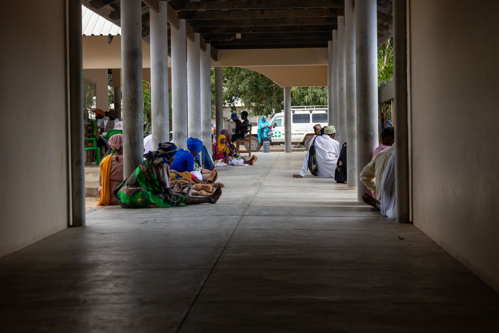 Patients wait at a corridor of the Rural hospital in Mocímboa da Praia, in the northern Mozambican province of Cabo Delgado. Mocímboa was once an epicentre of intense conflict, and the town faced widespread displacement and destruction. Location: Mozambique| Date: 16/10/2024 | Photographer: Marilia Gurgel