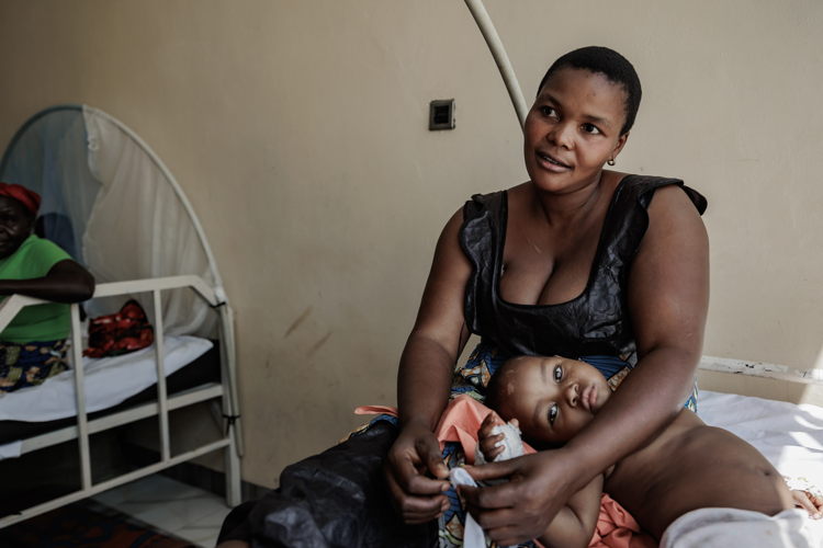 Clarisse*, a 34-year-old mother of five from Drodro, when armed groups infiltrated the courtyard, brandishing firearms and machetes, Clarisse swiftly secured her 3-year-old child and his older sister indoors for safety. Copyright: MSF Clarisse*, a 34-year-old mother of five from Drodro, when armed groups infiltrated the courtyard, brandishing firearms and machetes, Clarisse swiftly secured her 3-year-old child and his older sister indoors for safety. Copyright: MSF