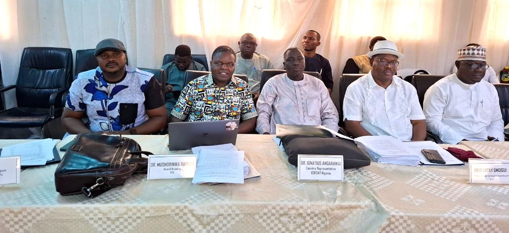 Dr Ignatius Angarawai (center) at the event marking the official release of the new varieties.