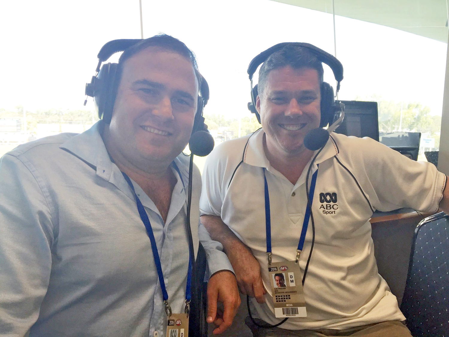 Four-time Ross Glendinning Medal winner Paul Hasleby in the Grandstand commentary booth with the ABC's Clint Wheeldon.