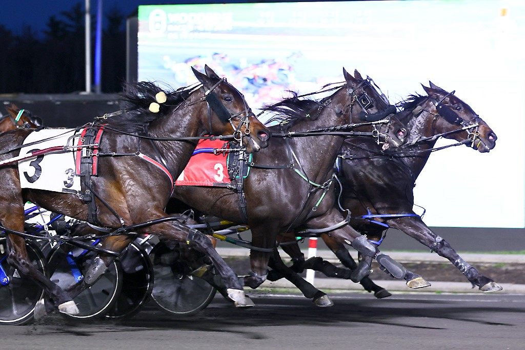 Gias Surreal (right) winning a three-way photo. (New Image Media)
