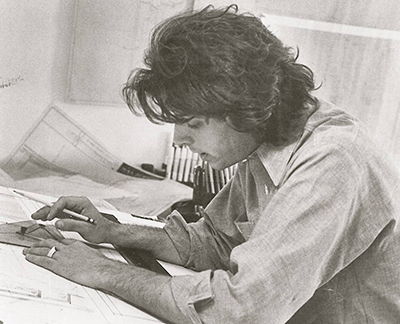 A young John Storyk at the drafting table
