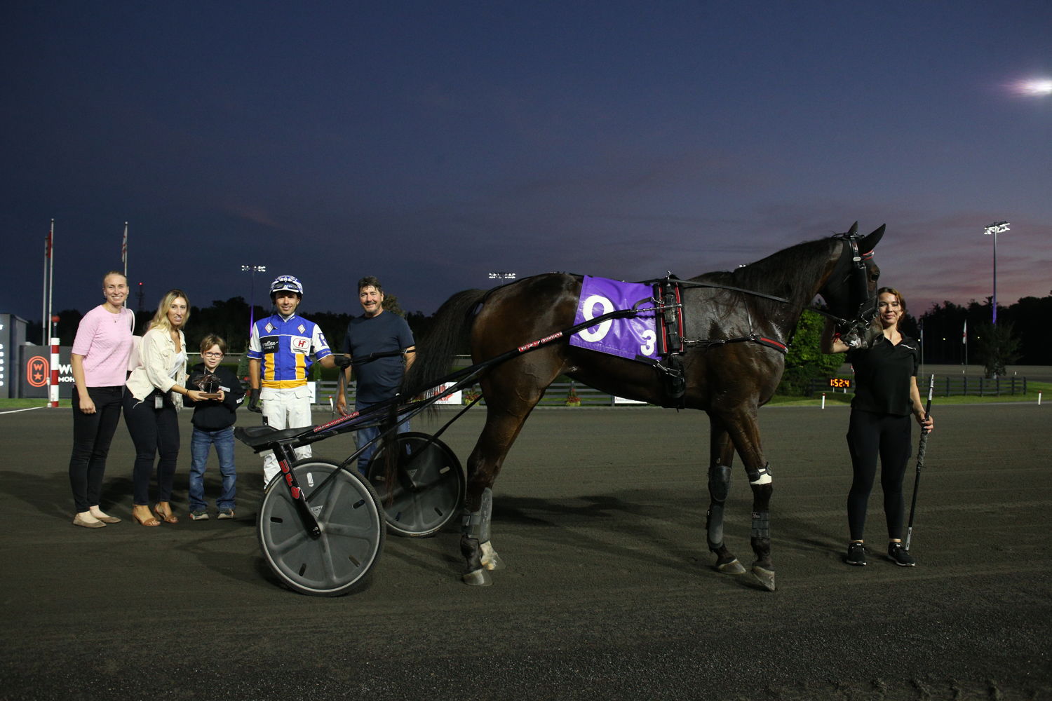 Drawn Impression and connections in the winner's circle for the Simcoe Stakes for 3-year-old fillies on August 31, 2024 (New Image Media)