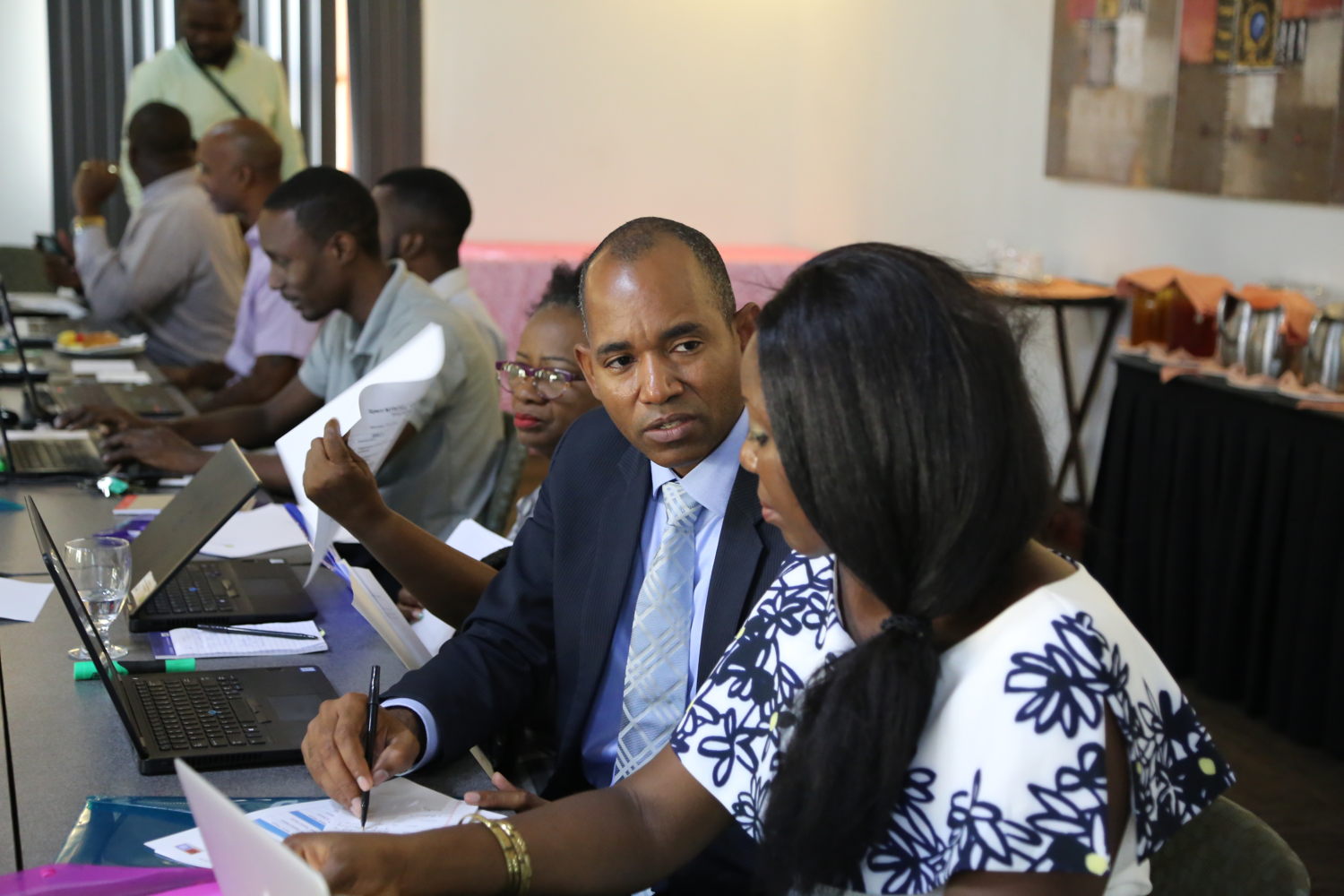 Dr. Cleophas D'Auvergne, coordinator of the TB/HIV Elimination Project and Mildred Fakoya, consultant and designer of the Clinical Management System.
