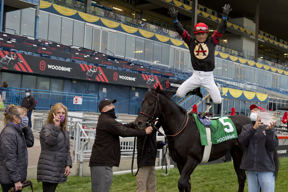 Silent Poet and Justin Stein celebrate with Nick Gonzalez winning the Nearctic Stakes at Woodbine in 2020. (Michael Burns Photo) Silent Poet and Justin Stein celebrate with Nick Gonzalez winning the Nearctic Stakes at Woodbine in 2020. (Michael Burns Photo)