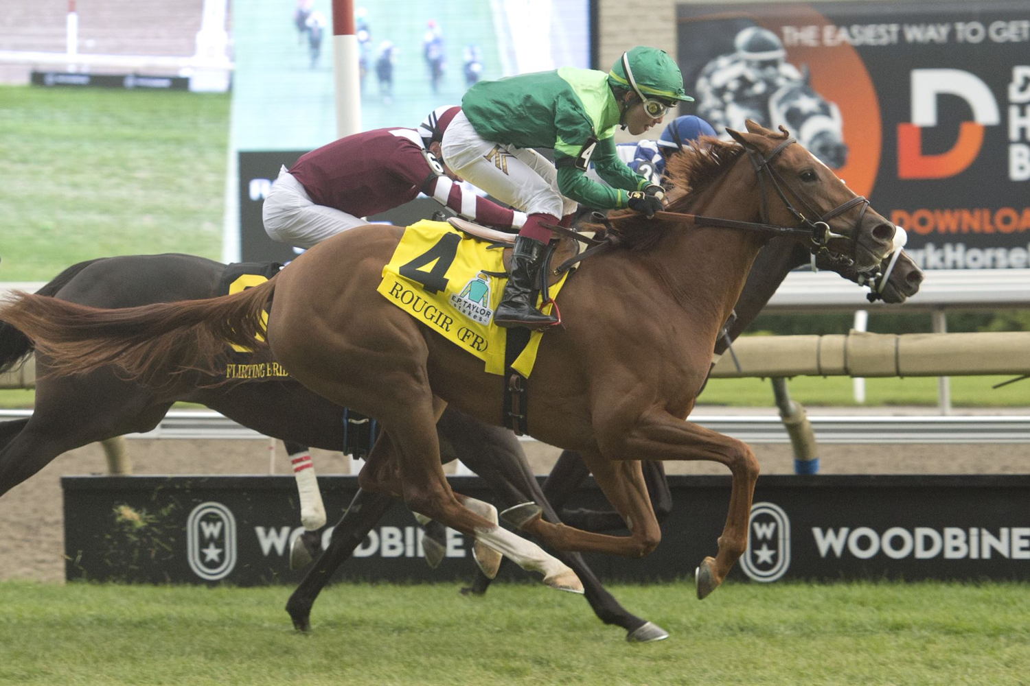 Rougir and jockey Kazushi Kimura winning the E.P. Taylor Stakes on October 8, 2022 at Woodbine (Michael Burns Photo)
