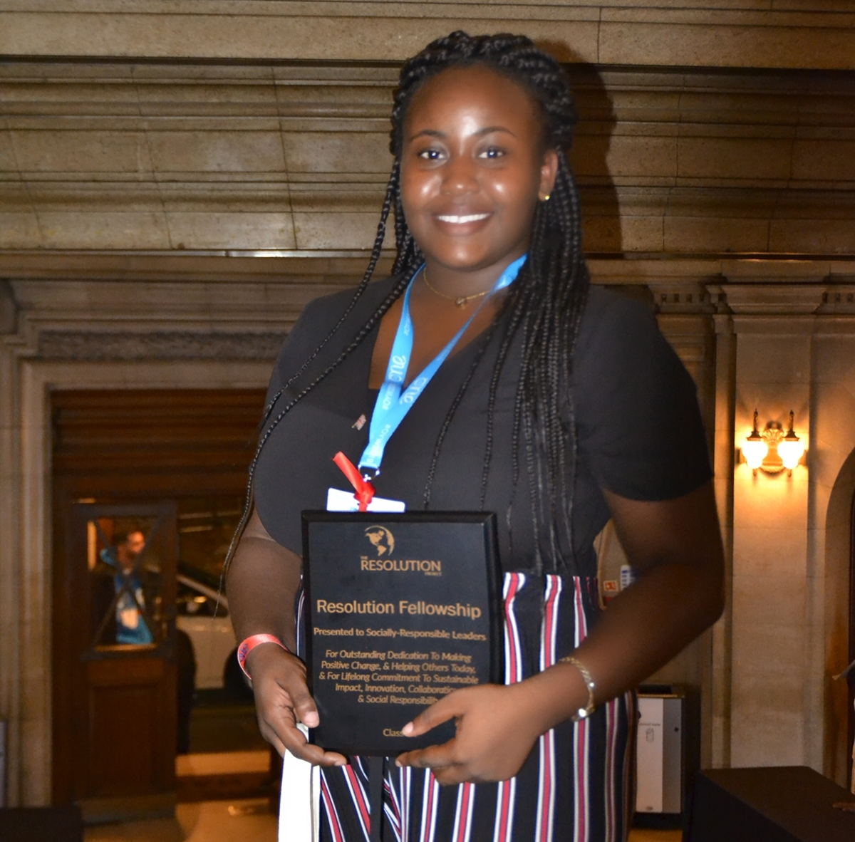 Jasmine receives her award and Fellowship package for YE!