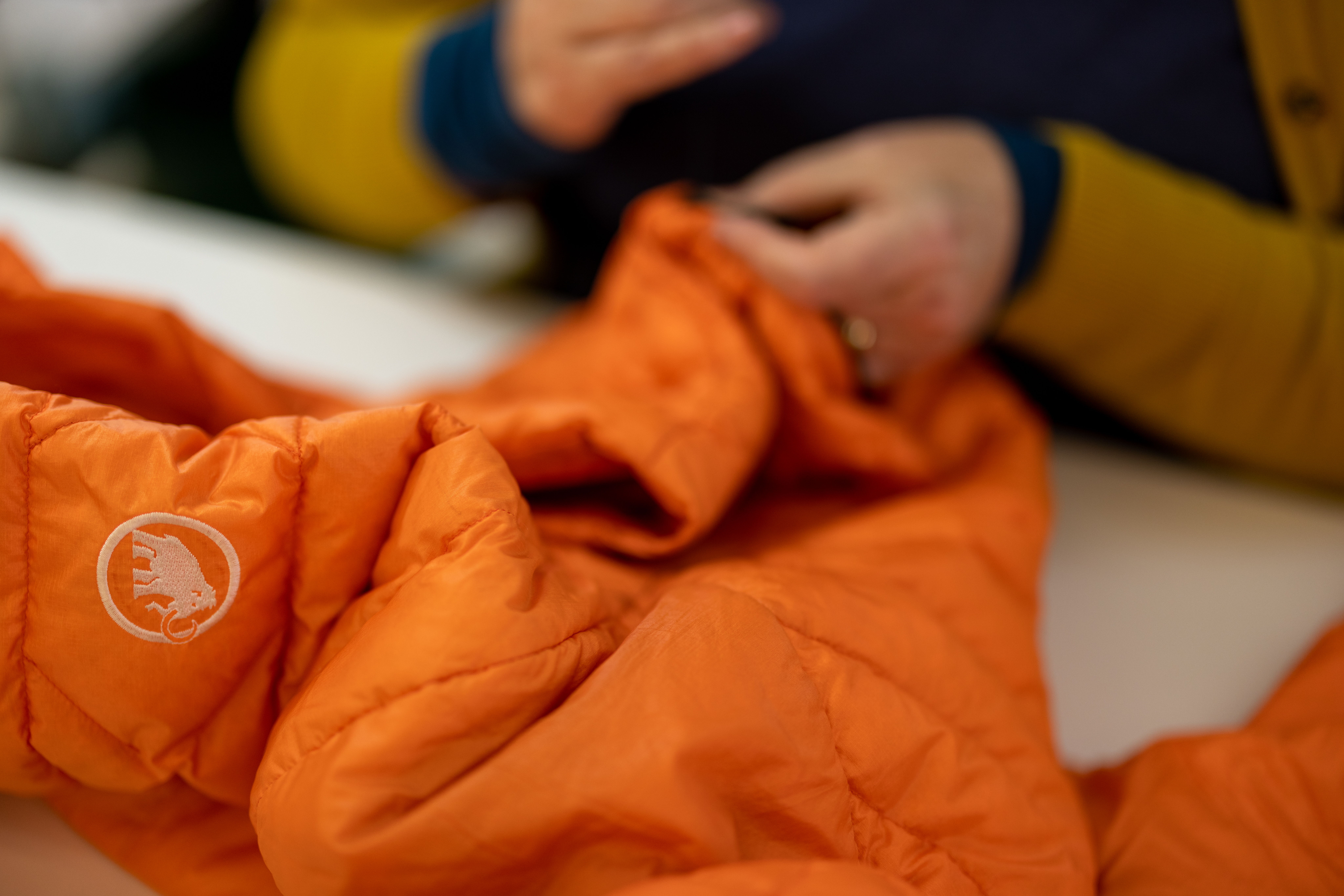 The down jacket is being made ready for the next mountain adventure. (Photo: Mammut Sports Group AG, Maximilian Gierl)