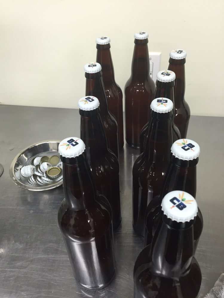 Capped bottles of Worth the Wait Cantaloupe Gose will be conditioned for 2 weeks before they're ready to drink.