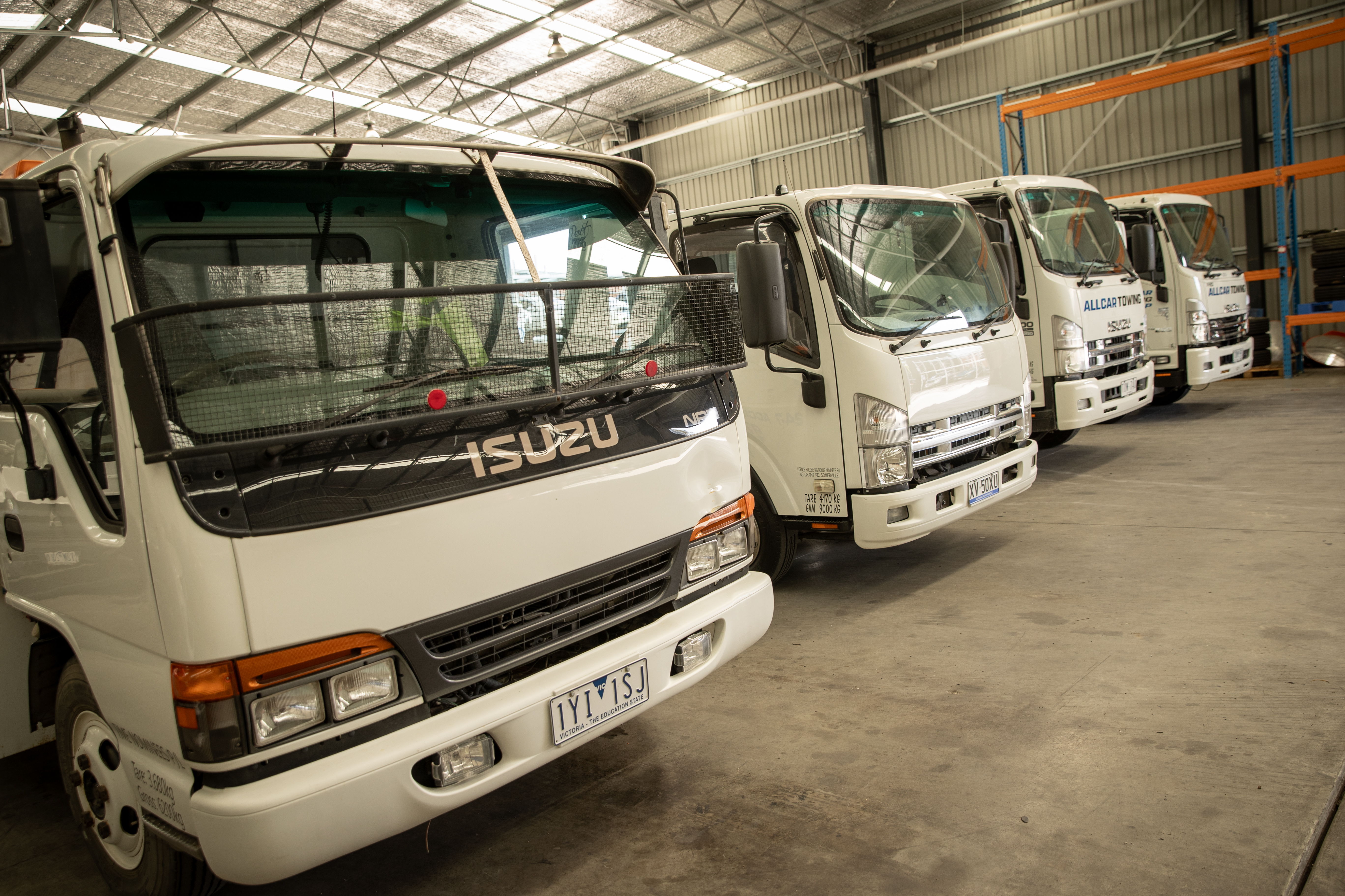 Classic Isuzu trucks can still be found in Milo's fleet, hard at work