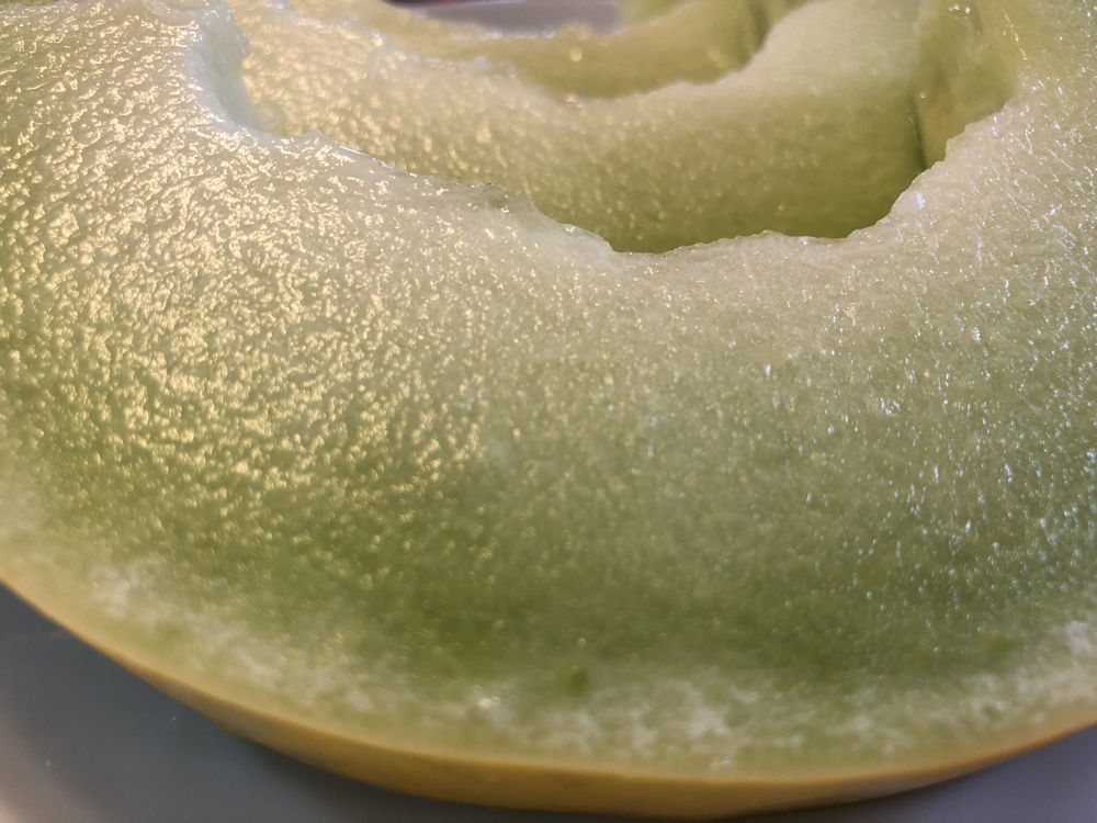 Sliced Rocky Ford White Honeydew melon.
