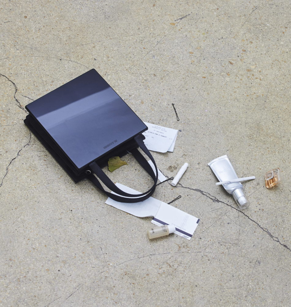 Case, 2022, Sound, Object at Studiolo Belleville/Sentiment, Paris, image by the artist Designer bag bought at price of artist fee, sold, re-sold or kept by the artist after the show; borrowed handbag content; spoken text found on online forum; piano music by Justin Raym)