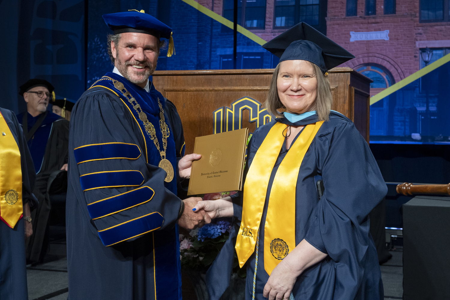 Lorrie Servati with President Todd G. Lamb