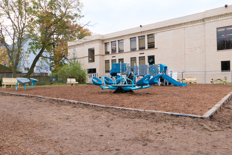 Over 100 DLC employee volunteers joined together to build the first playground in the Woodland Hills School District.