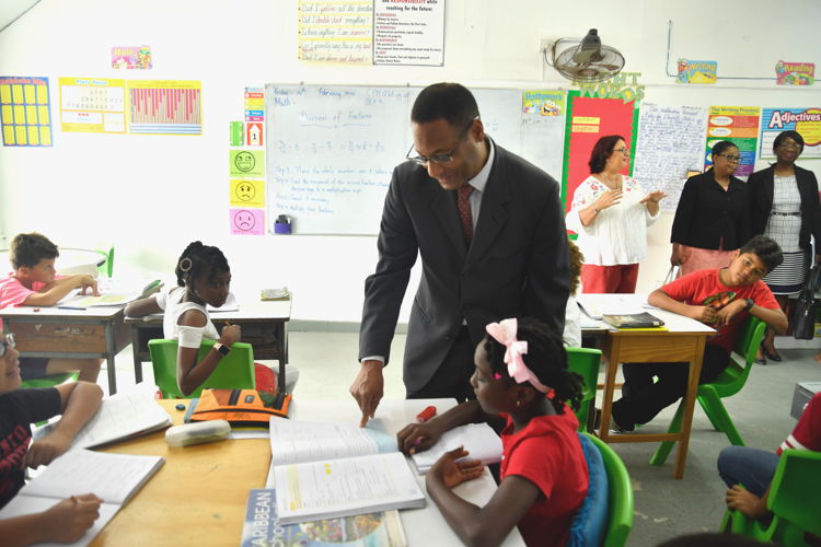 Mr. Clinton White USAID Representative to the Eastern and Southern Caribbean - engaging with students.