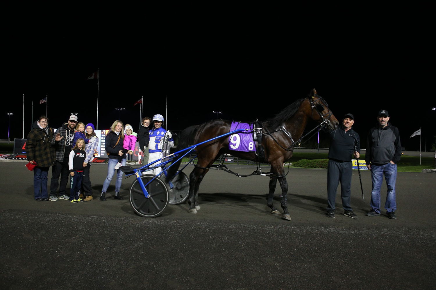 The connections of Redwood Hanover gathered in the Winner's Circle on May 20, 2023 (New Image Media) 