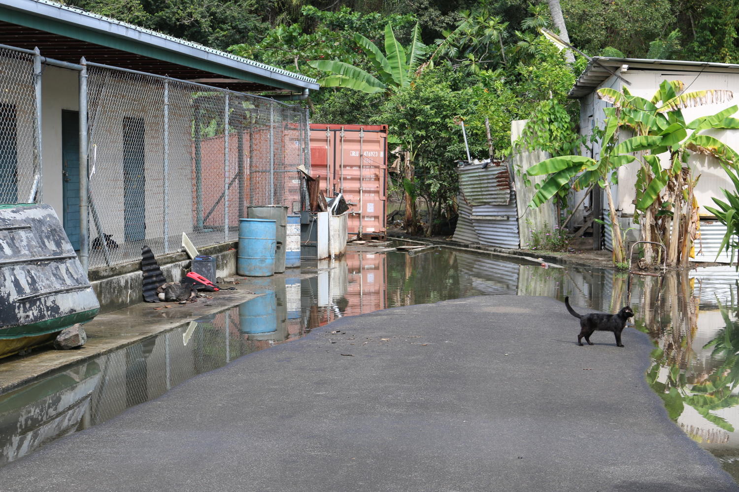 Food waters enter the village of Anse La Raye.