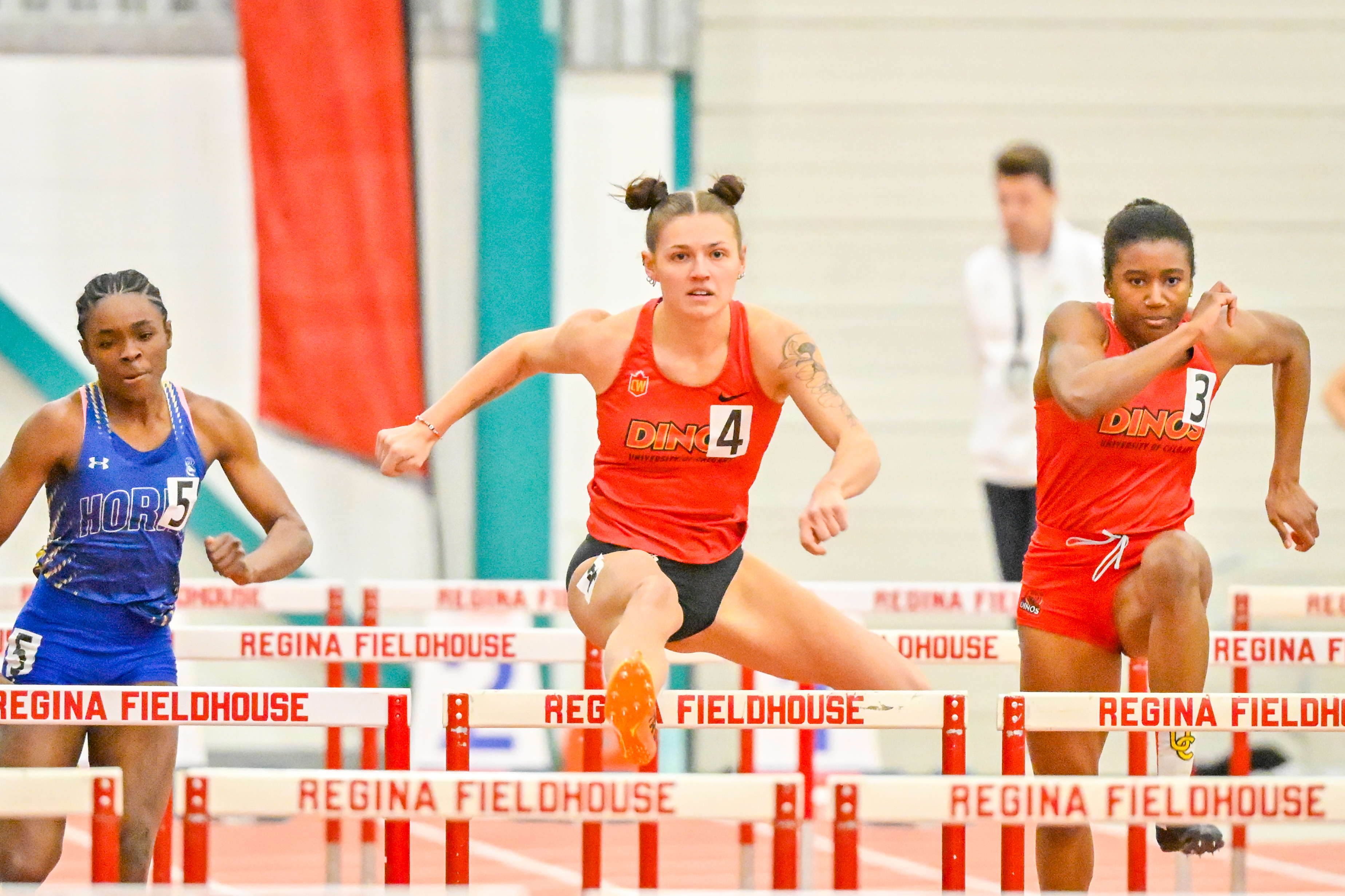 Sienna MacDonald set a new CW record in the 60m hurdles. Photo by Arthur Ward.