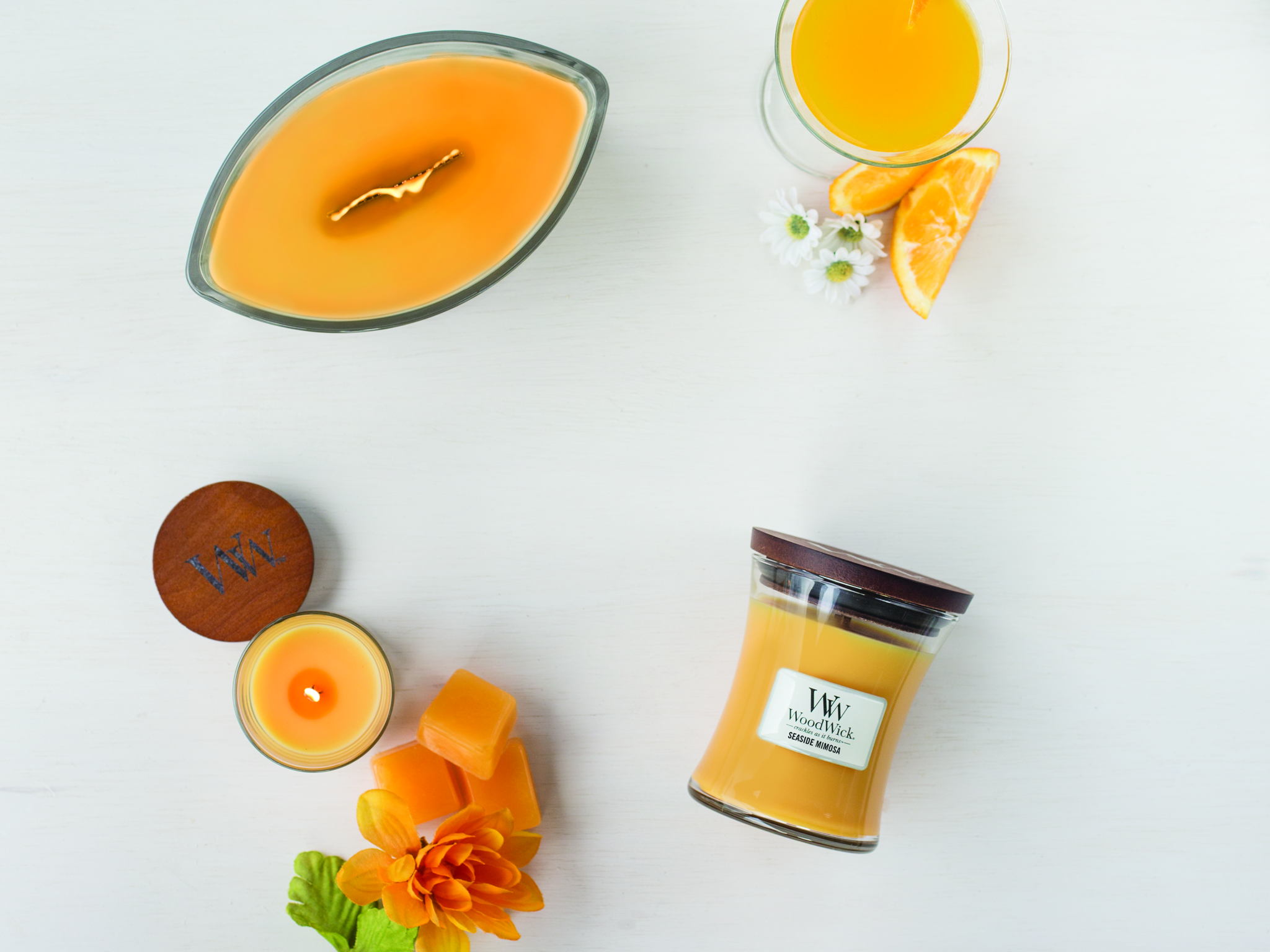 Les nouvelles bougies tropicales de WoodWick annoncent les beaux jours