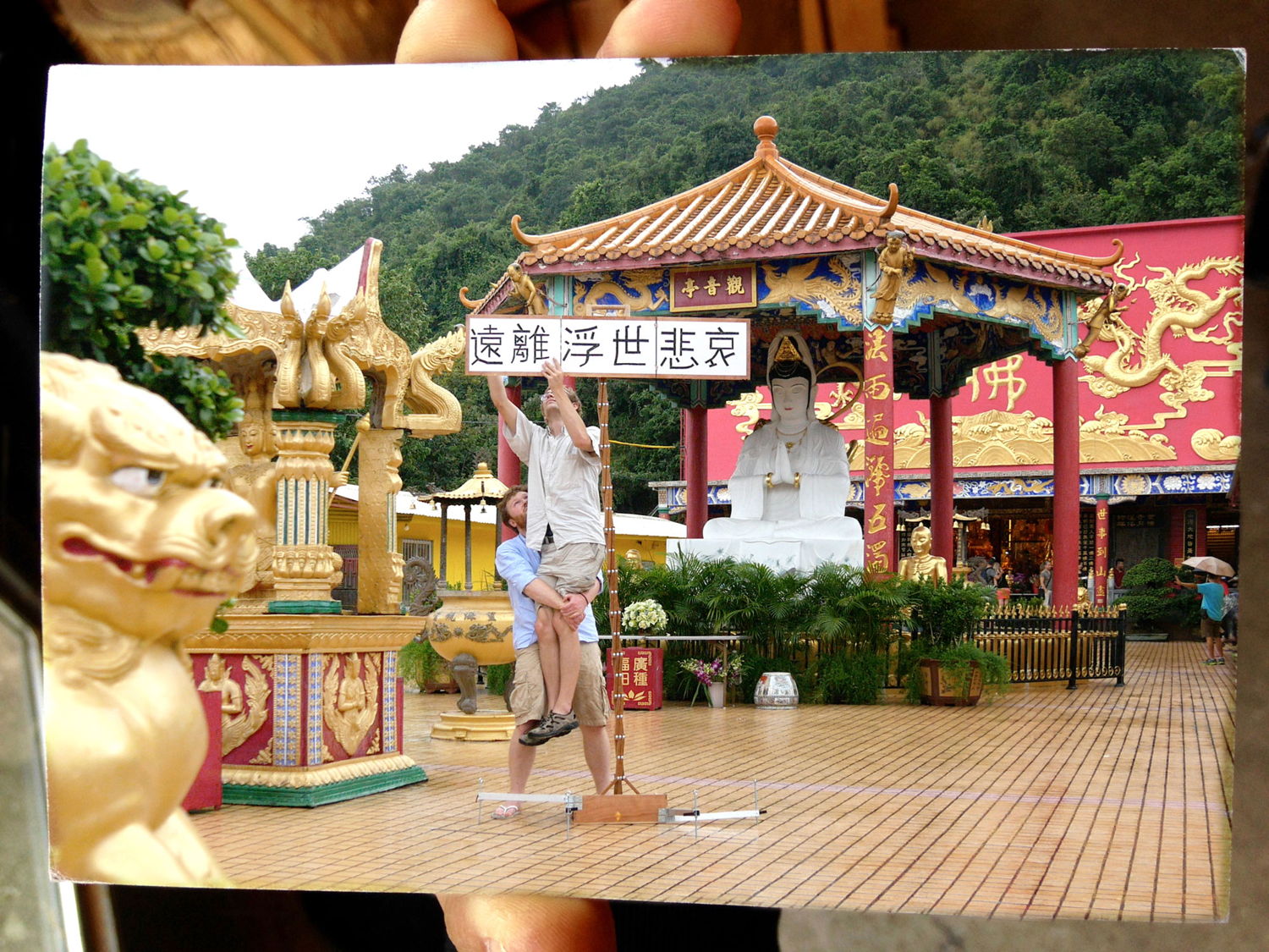 Frank&Robbert Robbert&Frank, GO AWAY SORROW OF THE WORLD - Postcard front, Ten Thousand Buddhas Hong Kong, 2015, signed & stamped postcard, 14,8 × 10,5 cm, courtesy F&R R&F