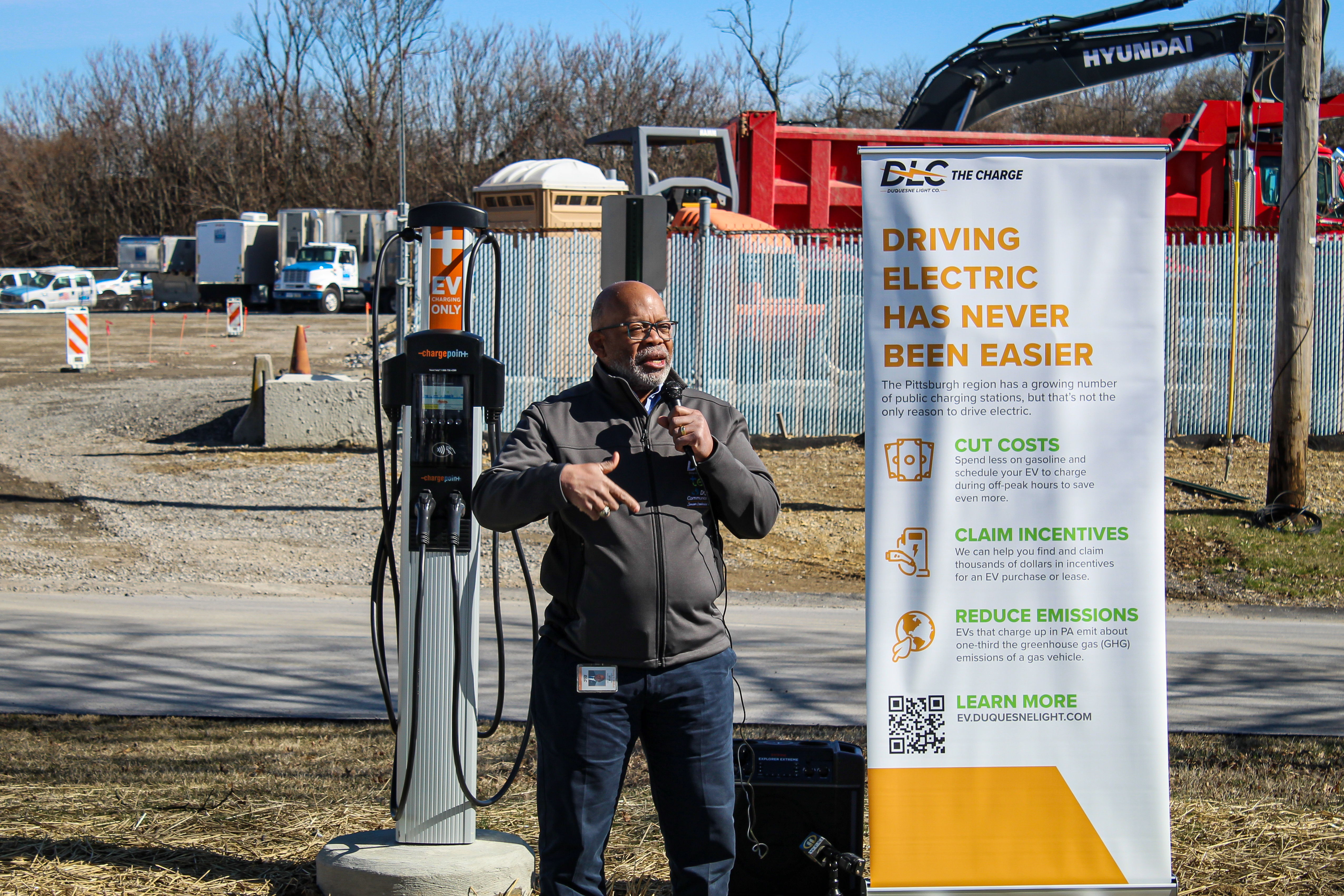 Duquesne Light Company President and CEO Kevin Walker speaks to media at the ribbon-cutting ceremony celebrating the launch of electric vehicle fleet charging in West Mifflin.