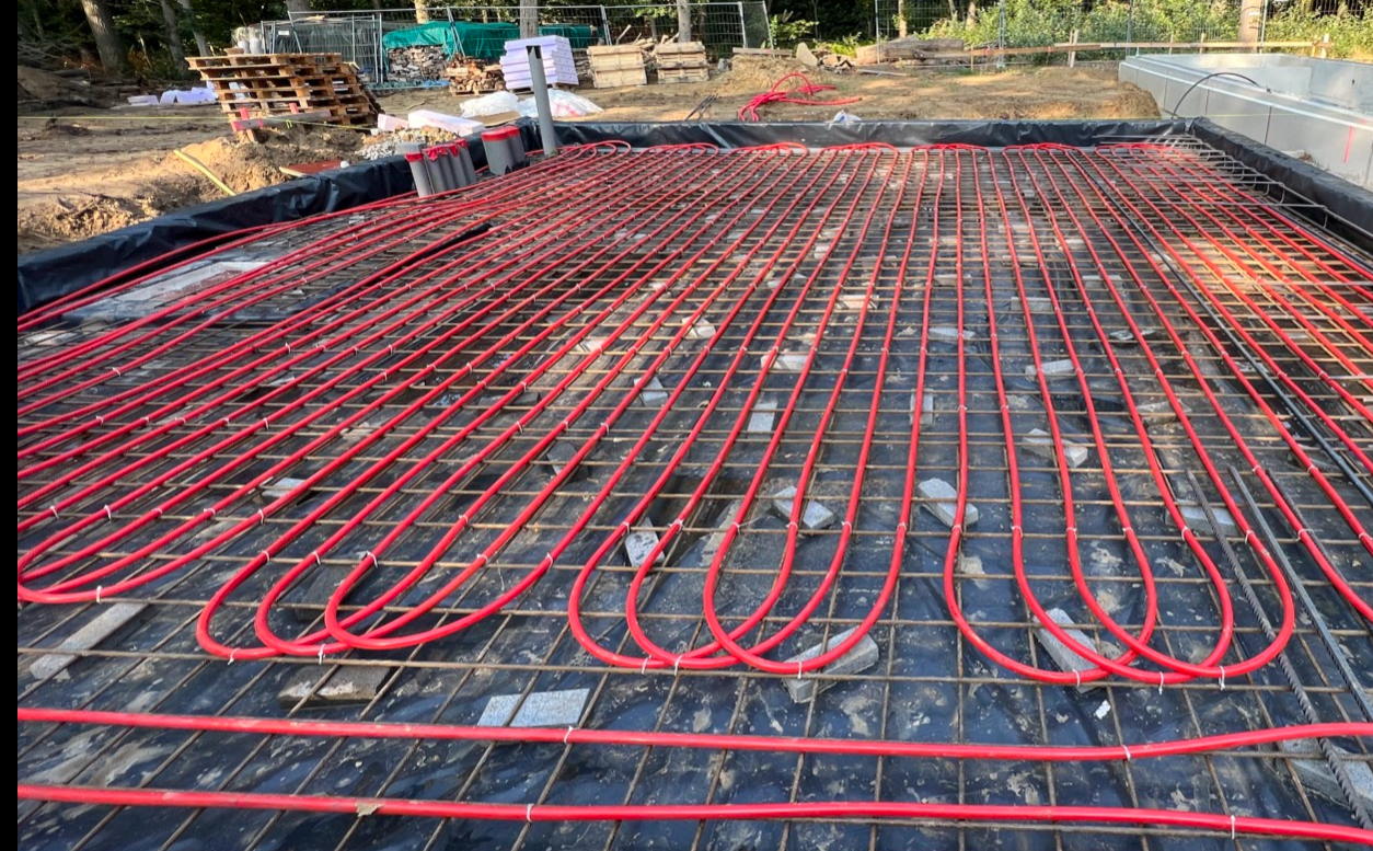 ©JACKON Insulation - Plaatsen betonkernactivering op onderste wapeningsnet