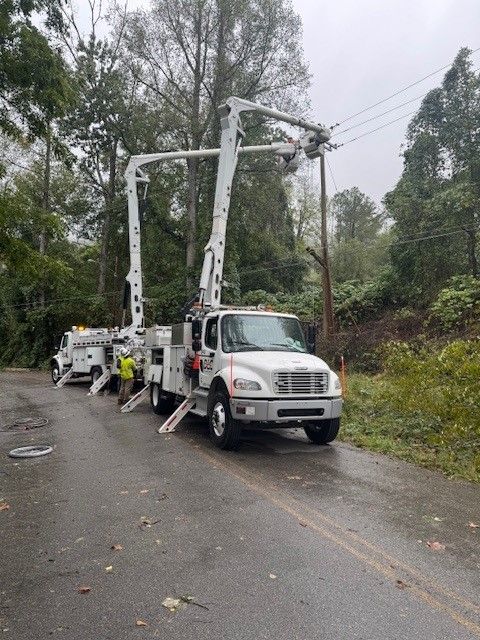 Crews work to restore power in the aftermath of the hurricanes