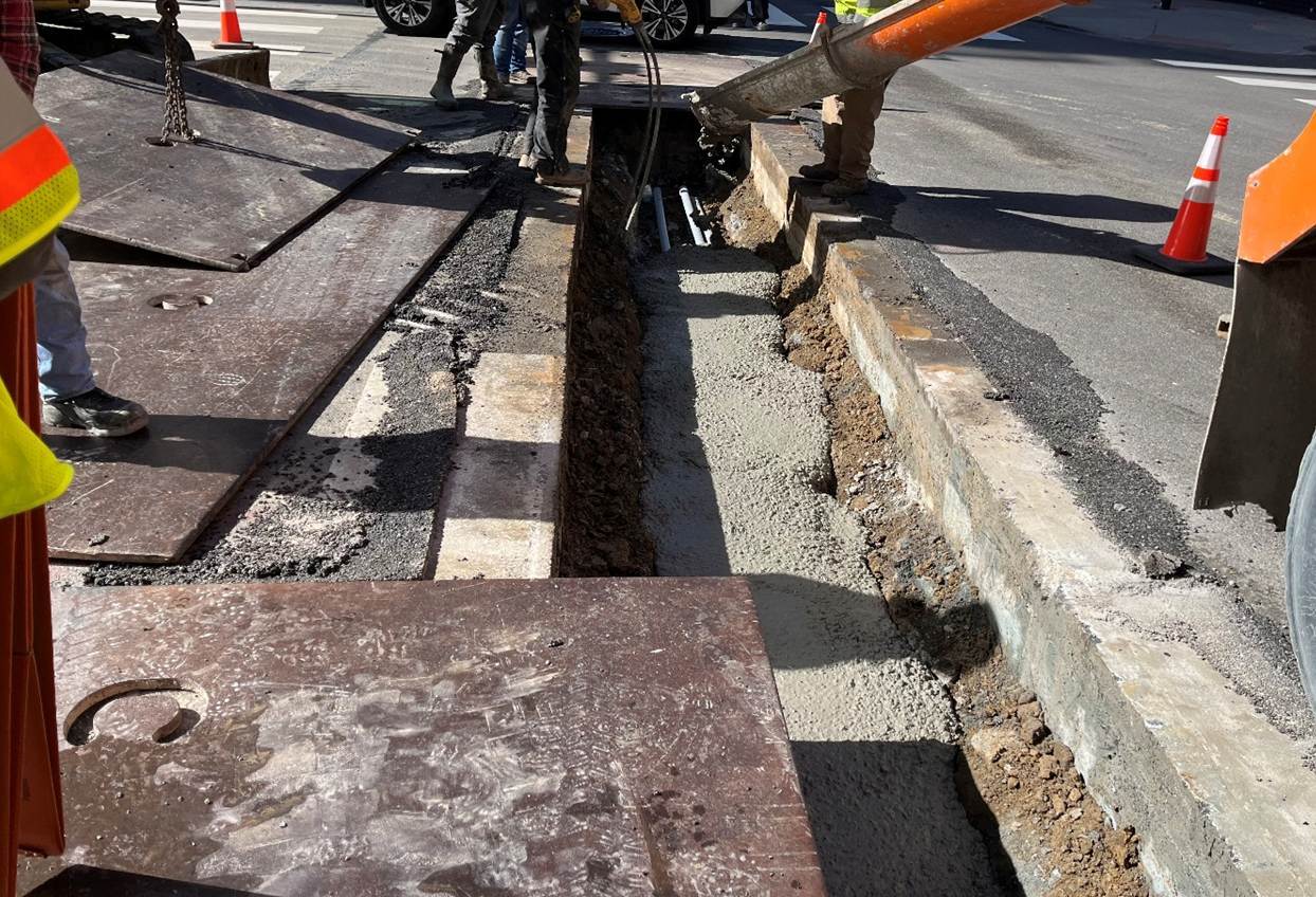 Electrical conduit recently placed and encased in concrete Electrical conduit recently placed and encased in concrete