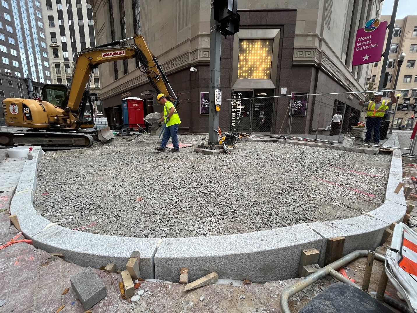 New granite curb recently placed at Sixth Avenue and Wood Street