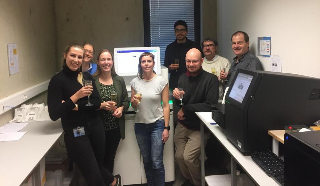 Celebrating the 2019 installation of the third NovaSeq6000 — part of a shared investment by VIB, KU Leuven, and UZ Leuven. The first two devices were acquired in 2017; this third unit was placed at the VIB Nucleomics Core. Celebrating the 2019 installation of the third NovaSeq6000 — part of a shared investment by VIB, KU Leuven, and UZ Leuven. The first two devices were acquired in 2017; this third unit was placed at the VIB Nucleomics Core.