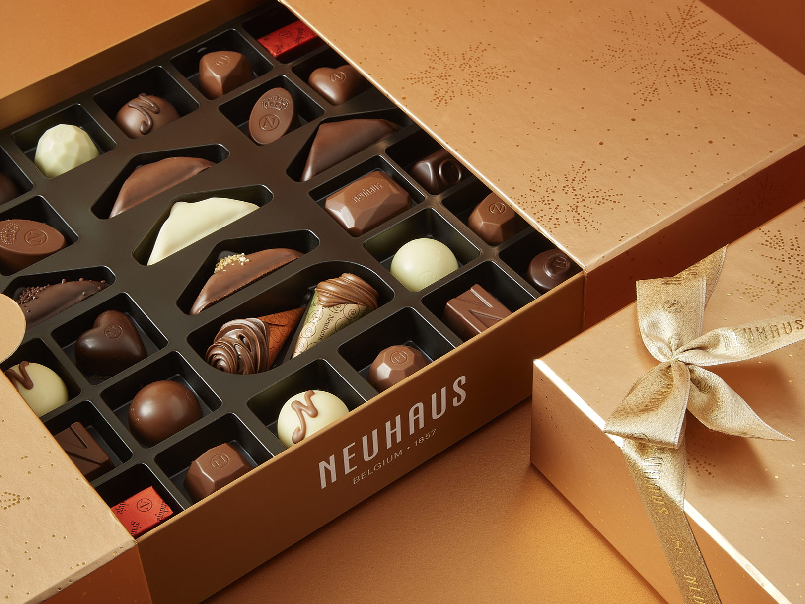 Add an extra dash of magic this Christmas with Neuhaus’ end-of-year collection